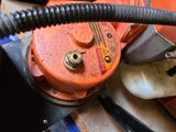 a close up of a tool on a table with other tools
