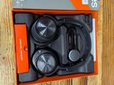 a box with a pair of headphones inside of it
