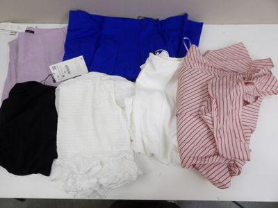 four pairs of underwear are laid out on a white table