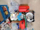a pile of assorted items sitting on the floor
