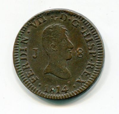 Gros plan sur une pièce de monnaie portant le visage d'un homme