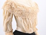 an image of a mannequin dress with a white blouse on a mannequin mannequin
