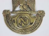 an image of a badge with an eagle on it
