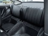 the interior of a car with black leather seats and black leather trims