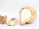 three pieces of wood that are sitting next to each other