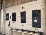a wall that has a bunch of different signs on it