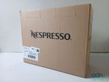 a box of nespresso coffee sitting on a table