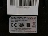 a label on the back of a black box with a barcode on it