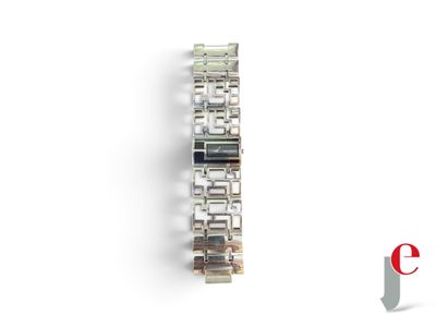 an image of a close up of a watch on a white surface