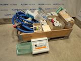 a box of electrical equipment sitting on the floor