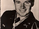 black and white photo of a young man in a military uniform
