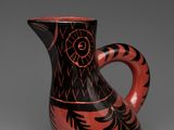 an image of a red and black vase on a gray background