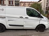a white van that is parked on the side of the street