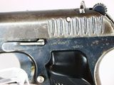 a gun that is sitting on top of a table