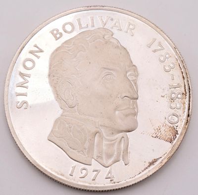 a close up of a coin with a picture of a man on it