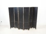 an image of a black room divider with four panels