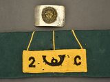 an image of a sign with a lion on it hanging from a hook