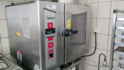 a machine that is sitting on a table in a kitchen