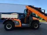a small orange truck with a crane on the back of it