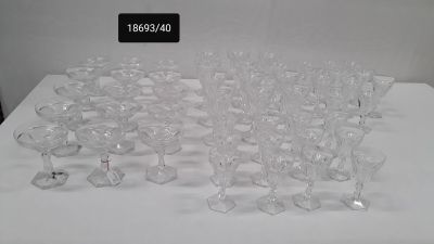 a lot of empty wine glasses sitting on a table
