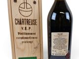 wooden box with a bottle of wine and a wooden box with a label on it