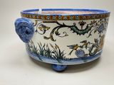 a blue and white bowl sitting on a table