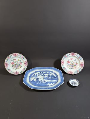 a set of three blue and white plates with flowers on them