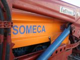 a close up of a tractor with a sign on it