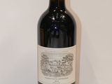 a bottle of wine that is sitting on a table