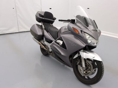 a motorcycle that is parked in a room