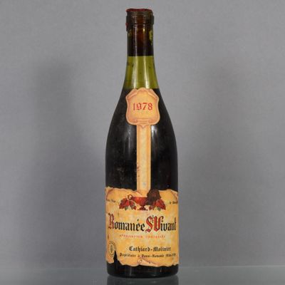 a bottle of wine that is sitting on a table