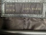 a close up of the label on the back of a jacket