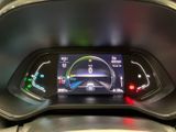 the dashboard of a car with a digital display on it