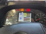 a dashboard with a speedometer and a clock on it