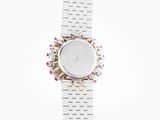 an image of a woman ' s wrist watch on a white background