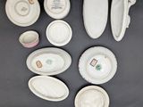 a lot of plates and bowls that are on the table