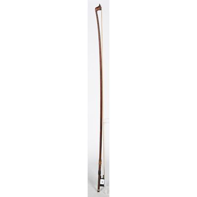 an image of a tall wooden pole with a long handle