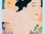 une photo d'une femme allongée sur un lit