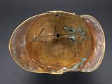 a clock that is on the shell of a shell