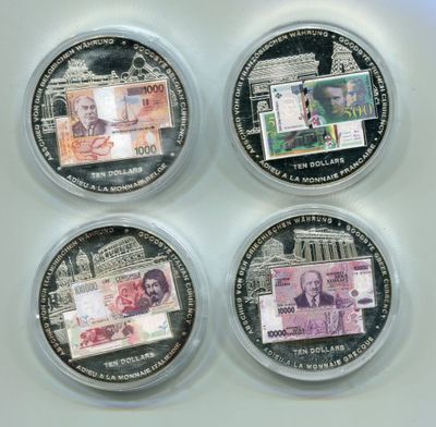 quatre types de monnaie différents sont présentés sur un fond blanc