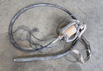 a metal object that is laying on the ground