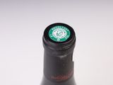a close up of a bottle of beer on a table