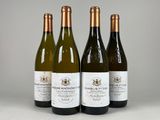 trois bouteilles de vin sont alignées sur une table