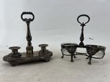 pair of antique silver plated candlesticks on stand