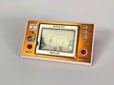 a small electronic game that is sitting on a table