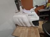 a box that has a camera attached to it on a desk