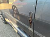 a close up of a car with a sticker on it