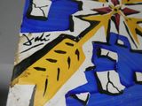 a close up of a painting on a table