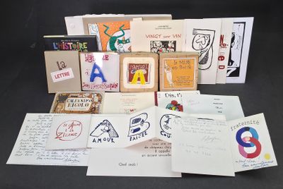 many different types of cards and envelopes on the table