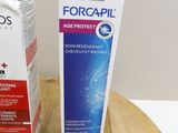 a box of toothpaste next to a box of toothpaste on a cutting board